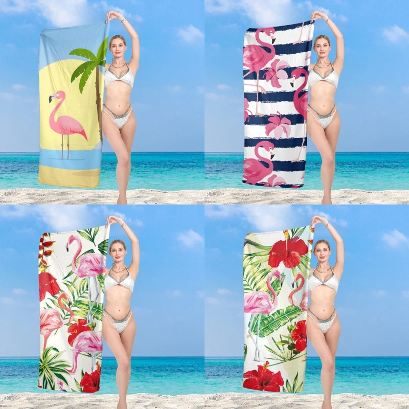 Elegantes und funktionales Strandtuch mit tropischem Flamingo-Design Skanto