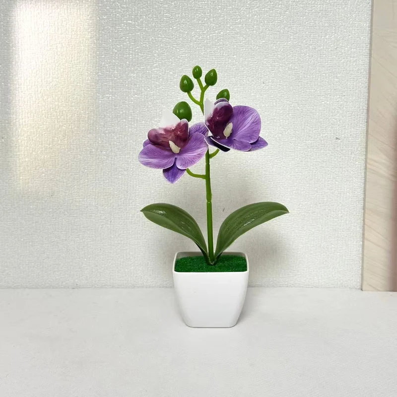 Lebensechte dekorative Orchideenpflanze für die Wohnkultur