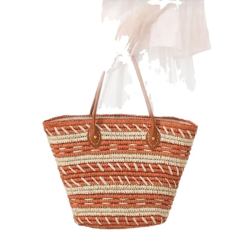 Handtasche aus gewebtem Naturmaterial mit stilvollen Ledergriffen Skanto