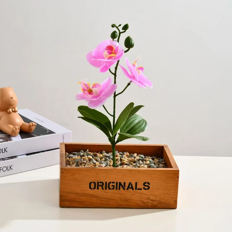 Elegante künstliche Orchideenarrangement für Tischdekoration