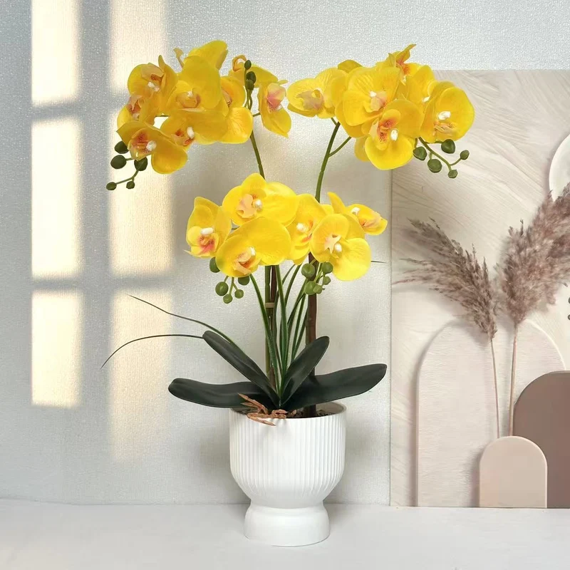 Elegante künstliche Orchideenarrangement für Tischdekoration Zuhause