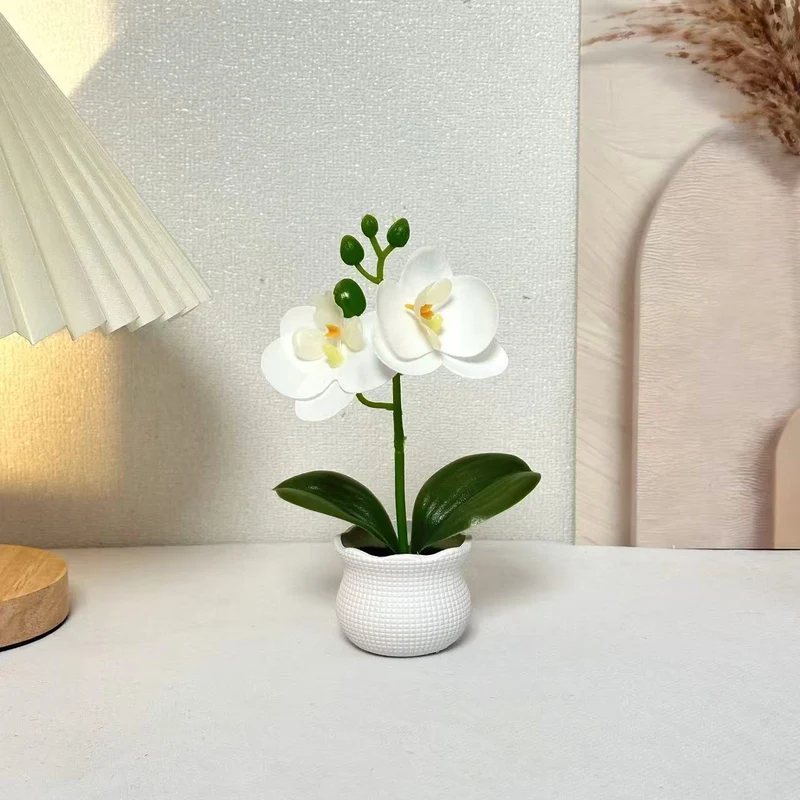 Elegante künstliche Orchideenpflanzenanordnung für die Wohnkultur-Darstellung