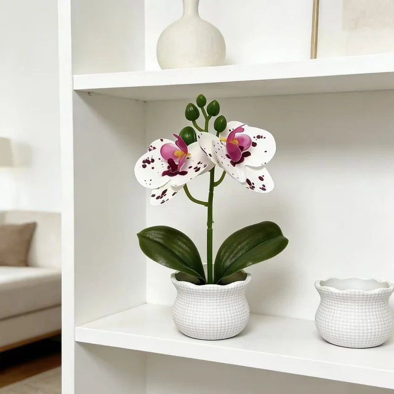 Elegante künstliche Orchideenpflanzenanordnung für die Wohnkultur-Darstellung