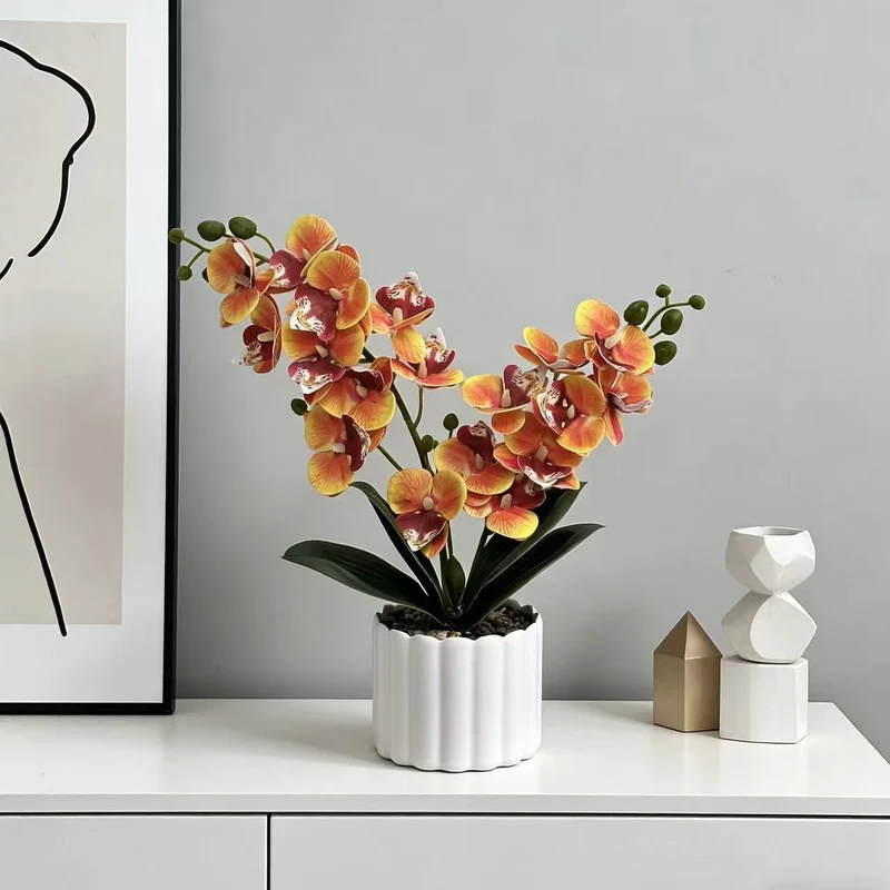 Elegante künstliche Orchideenpflanzenanordnung für die Innendekoration