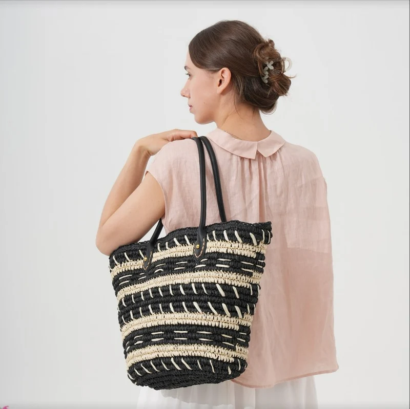 Dekorative Strohtasche mit robusten Ledergriffen Skanto