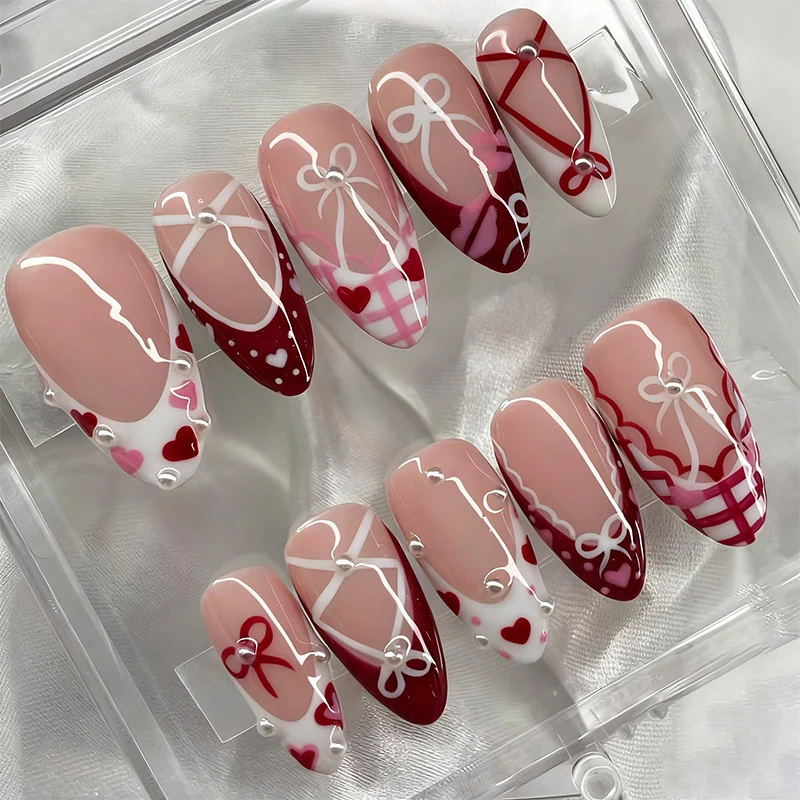 Dekoratives Presse-On Nagelkunstset mit Schleifen- und Herzen-Designs Brehn