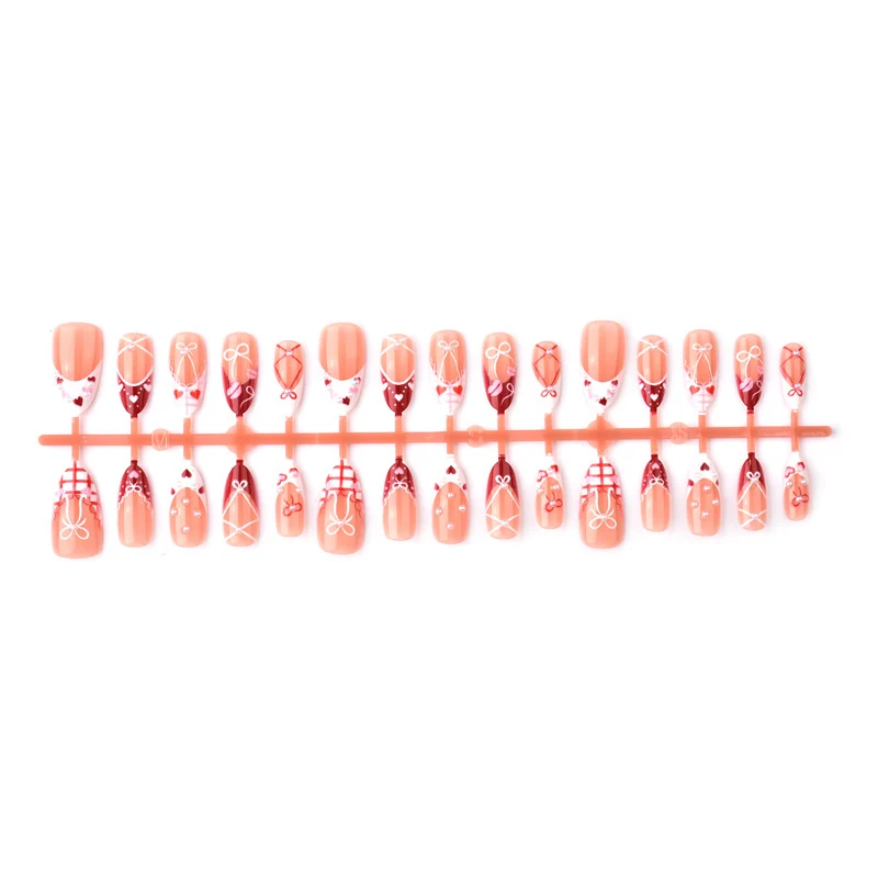 Dekoratives Presse-On Nagelkunstset mit Schleifen- und Herzen-Designs Brehn