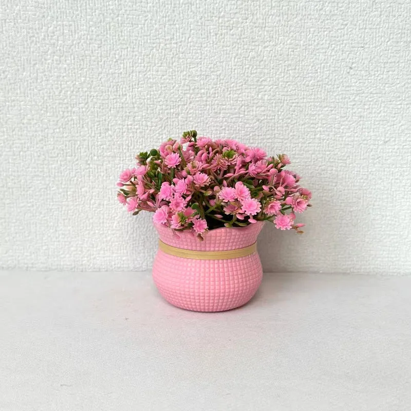 Dekorative Miniatur Kunstblumen Arrangement