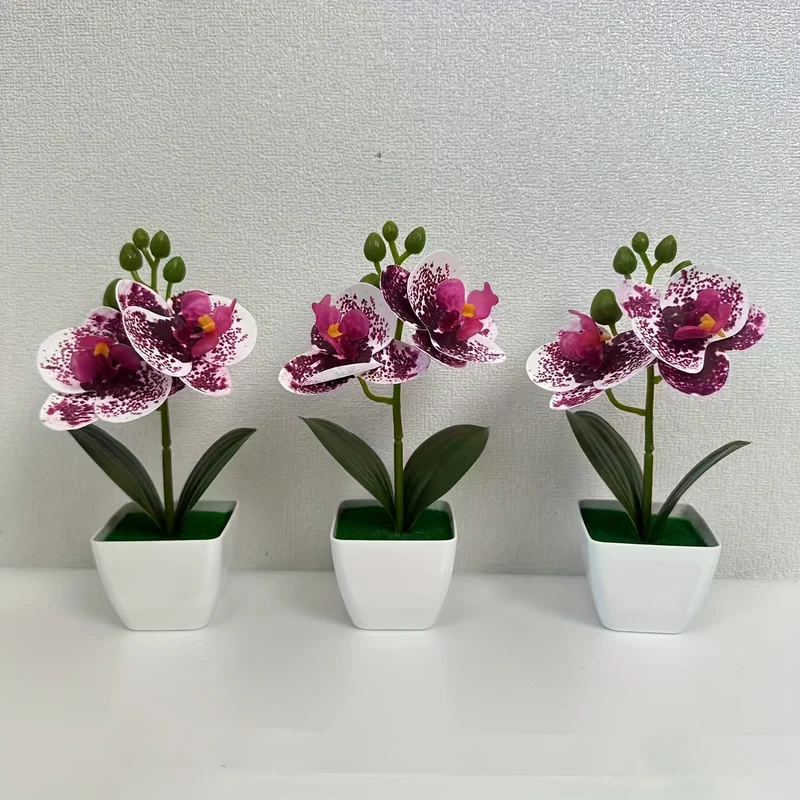 Dekorative künstliche Orchideenarrangement für die Wohnkultur展示