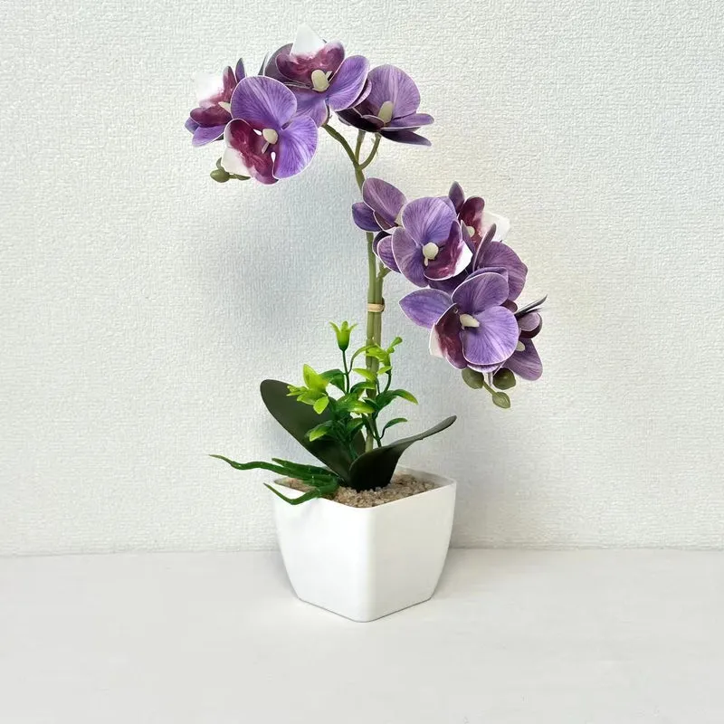 Künstliches Orchideenarrangement für die Wohnkultur-Darstellung