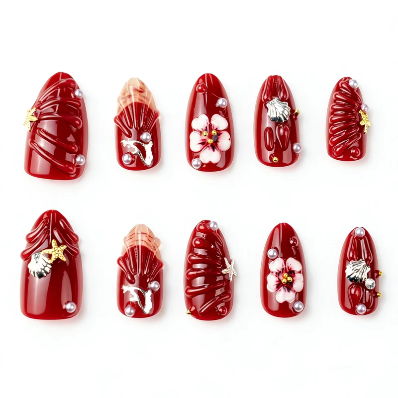 Künstlerisches Press-On Nagelkunst Set mit floralen und Muschel-Designs Brehn