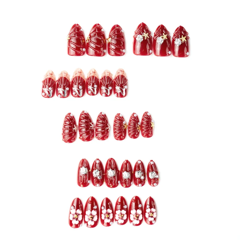 Künstlerisches Press-On Nagelkunst Set mit floralen und Muschel-Designs Brehn