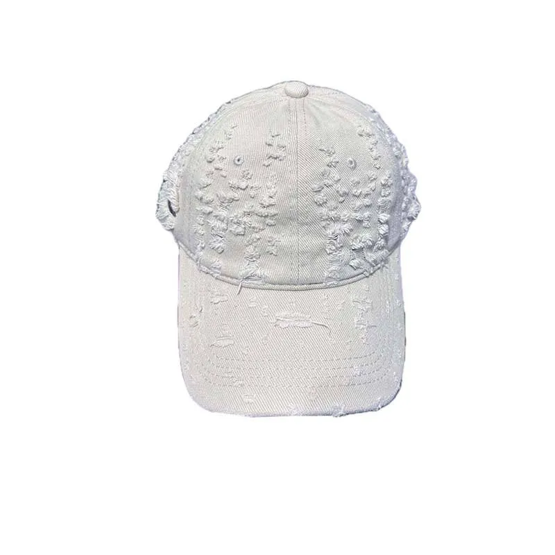 Damen Baseballkappe im Used-Look aus Jeans Skanto