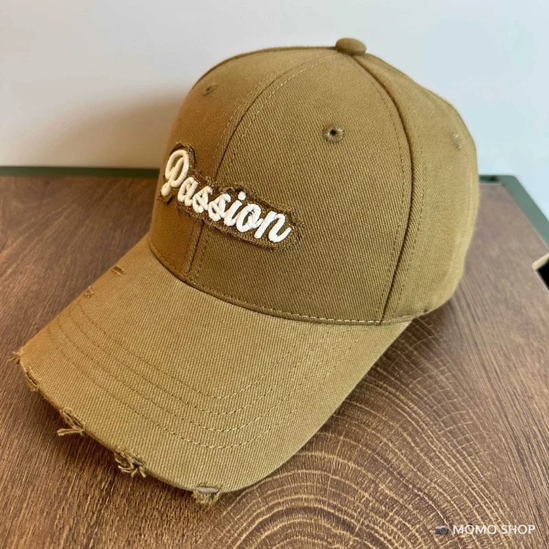 Damen Baseballkappe aus Baumwolle im Used-Look mit gesticktem Zitat Skanto