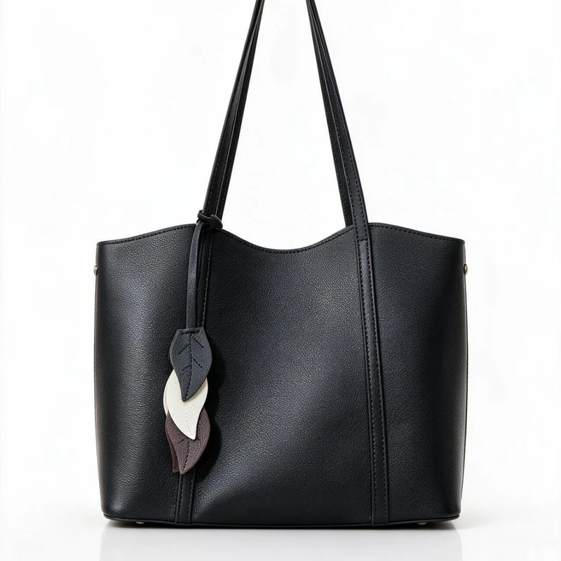 Gepunktetes vegan-leder strukturiertes Tote mit Blattcharm & langen Schulterträgern