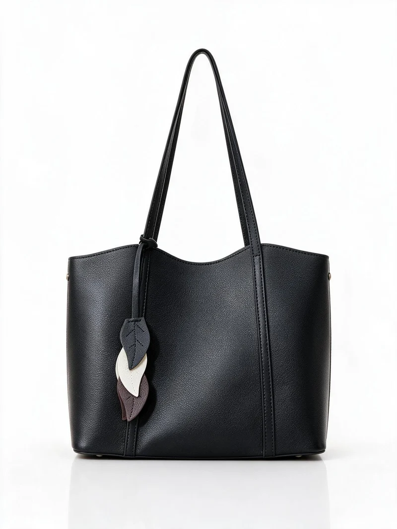 Gepunktetes vegan-leder strukturiertes Tote mit Blattcharm & langen Schulterträgern