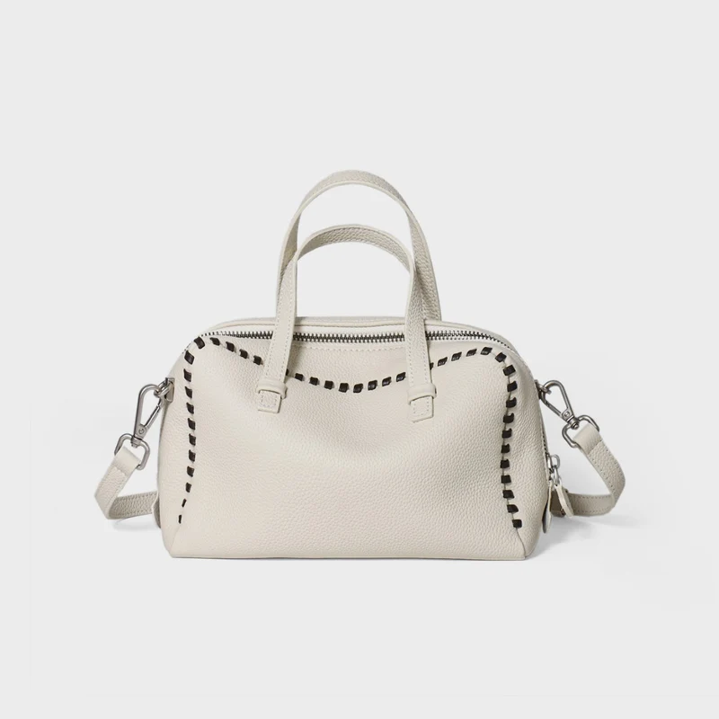 Gepunktetes Leder Arztstil-Satteltasche mit Whipstitch-Trimm und abnehmbarem Crossbody-Gurt