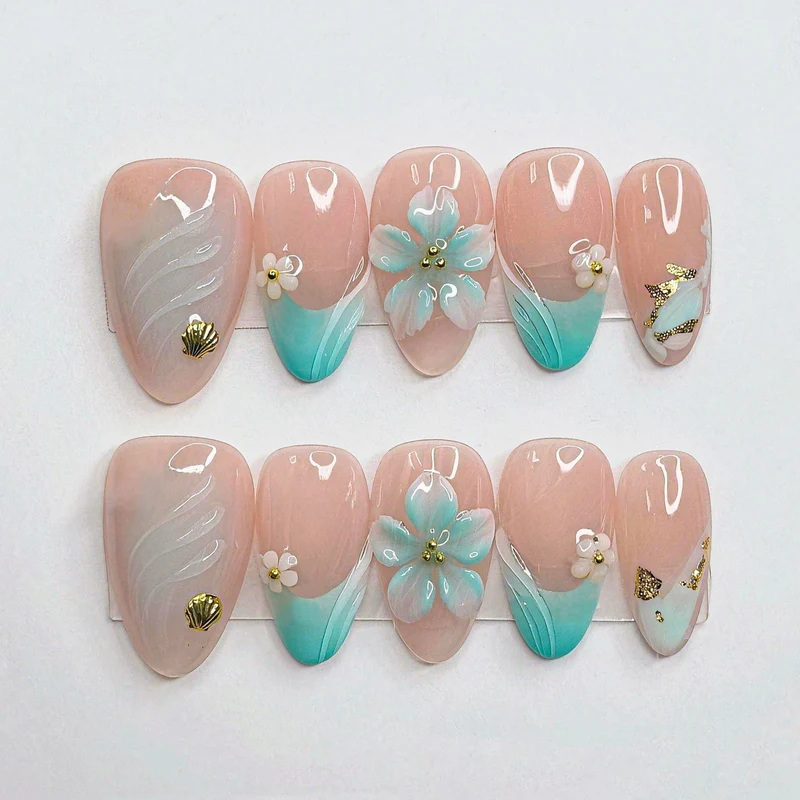 Künstlerisches Muscheln-inspiriertes Nagelset Brehn