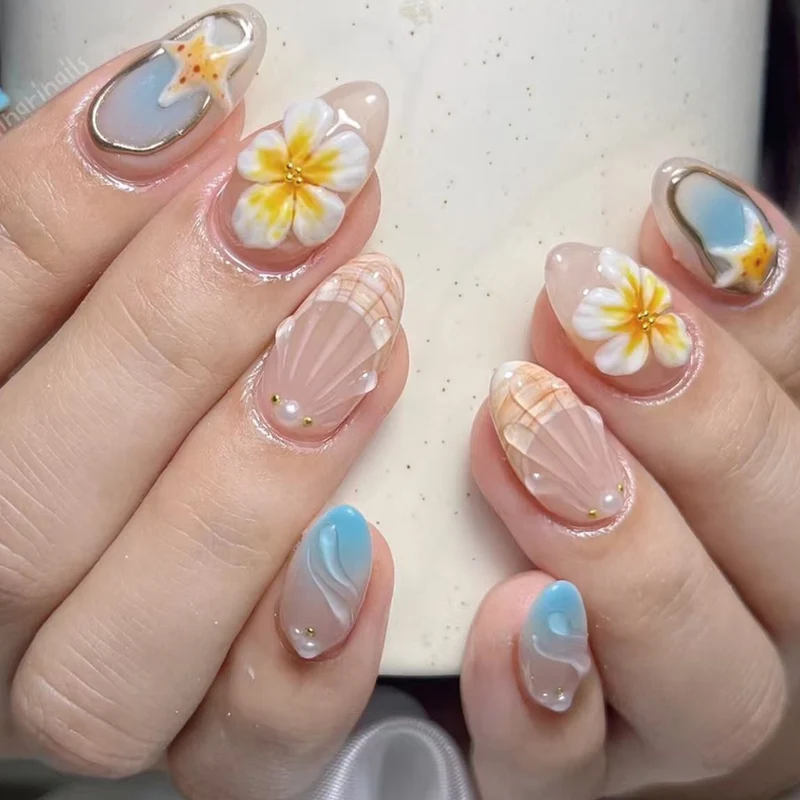 Künstlerisches Muschel- und Blumen-Press-On-Nagelkunst-Set Brehn
