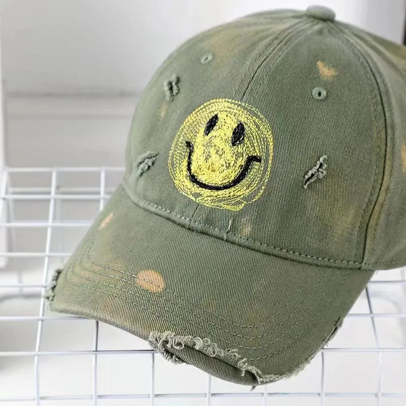 Damen Baseball Cap im Used-Look mit Smiley-Gesicht Skanto