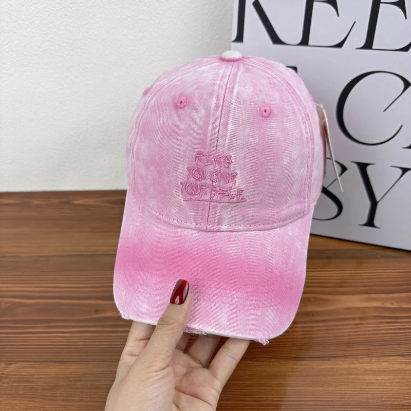 Damen Baseballkappe im Used-Look mit Motiv Skanto