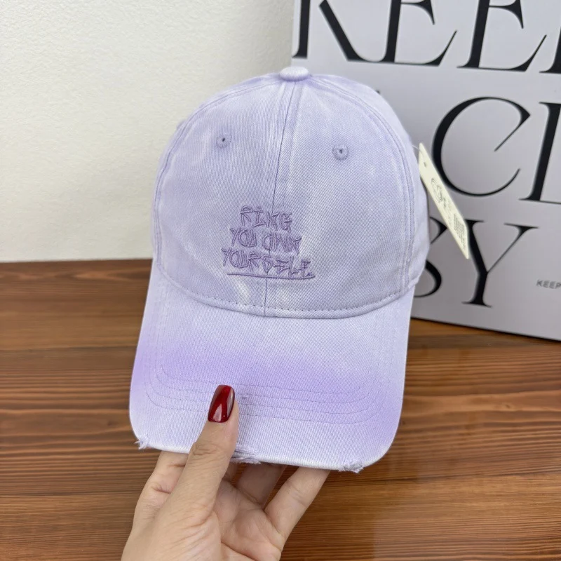 Damen Baseballkappe im Used-Look mit Motiv Skanto