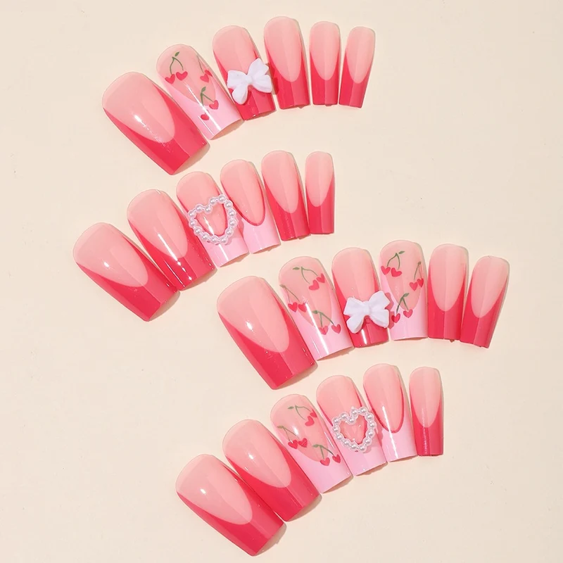 Kunstnagelset mit romantischen Kirschmotiven und eleganten Akzenten Brehn