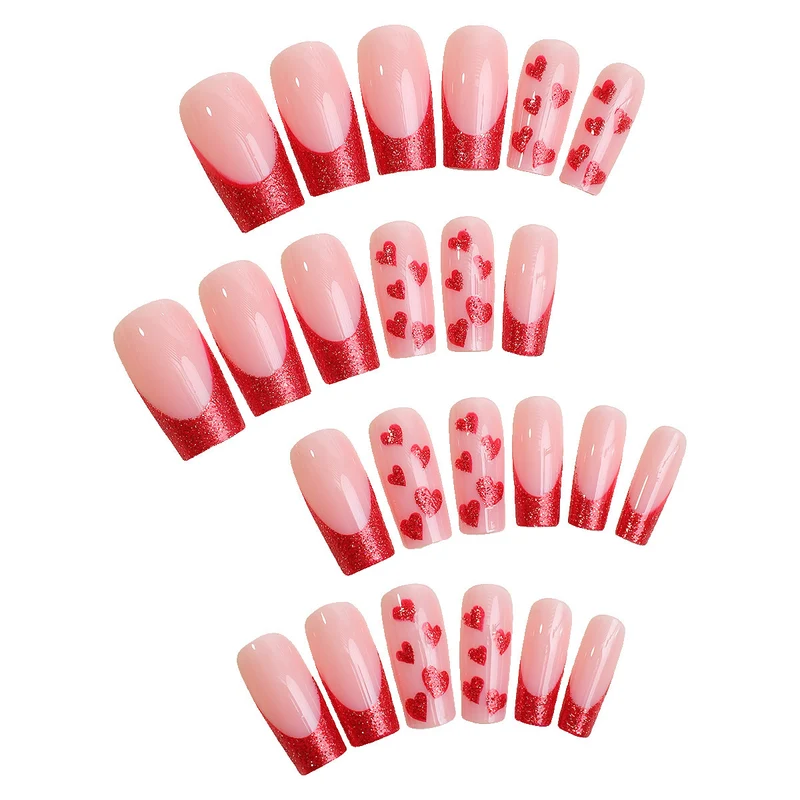 Kunstnagelset mit romantischen Herz-Designs und Glitzerakzenten Brehn
