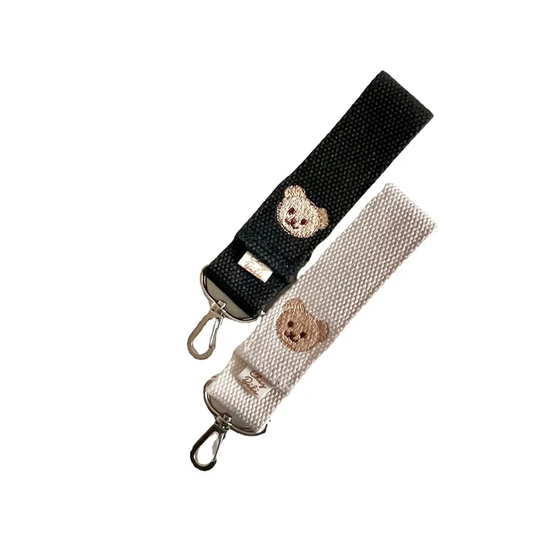 Gewebtes Schlüsselband mit gesticktem Bärenmotiv und drehbaren Metallclips