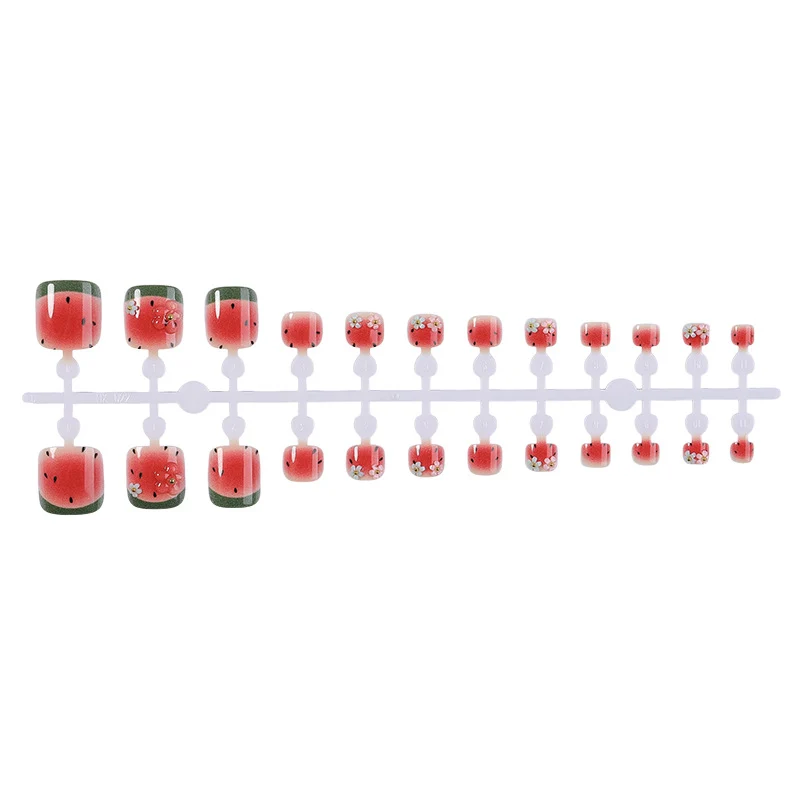Kunstnagelset mit Wassermelonen-Design und floralen Akzenten Brehn
