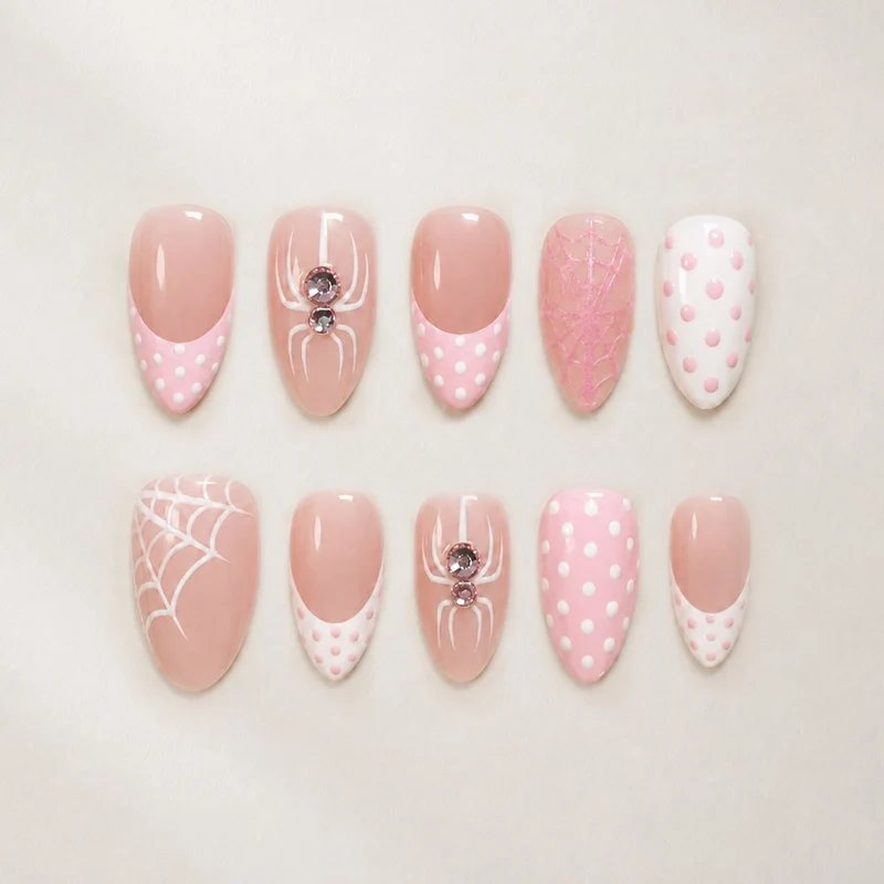 Kunstnagelset mit verspielten Spinnen- und Punkte-Motiven Brehn