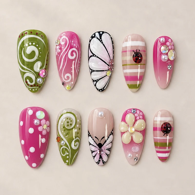 Kunstnagelset mit verspielten Blumen- und Glitzermotiven Brehn