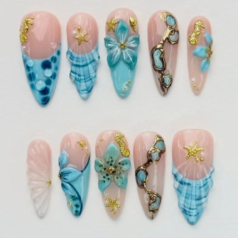 Kunstnagelset mit luxuriösen 3D-Motiven und Glitzerakzenten Brehn