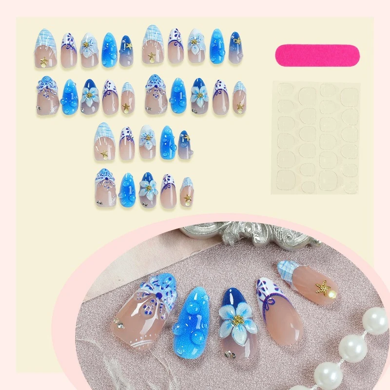 Kunstnagelset mit maritimen Designs und floralen Akzenten Brehn