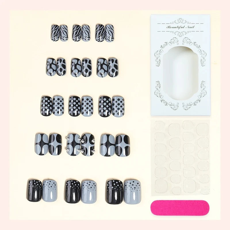 Kunstnagelset mit stilvollen Schwarz- und Grautönen Brehn