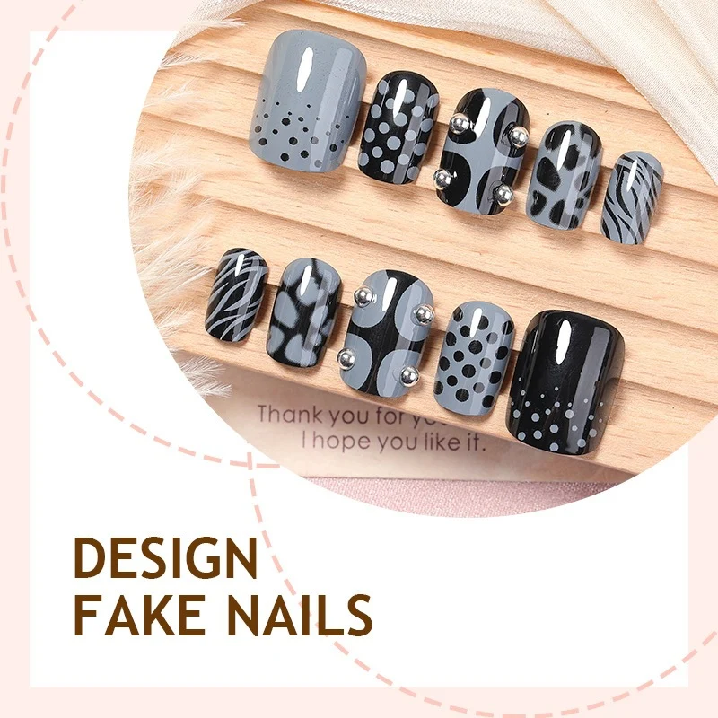 Kunstnagelset mit stilvollen Schwarz- und Grautönen Brehn