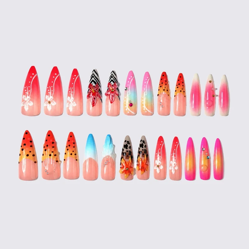 Kunstnagelset mit kreativen floralem Design und Glitzerelementen Brehn