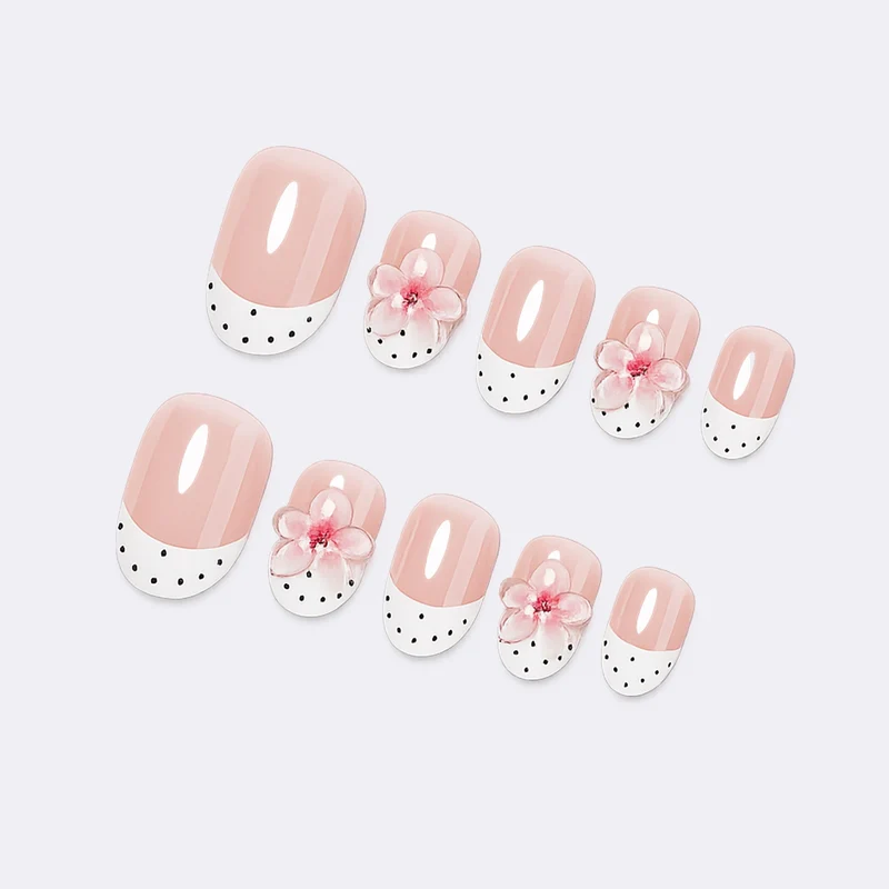 Kunstnagelset mit floralem und gepunktetem Design Brehn