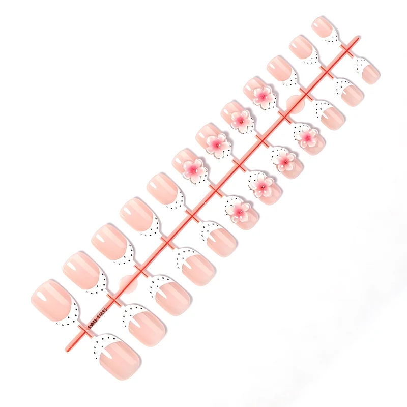 Kunstnagelset mit floralem und gepunktetem Design Brehn