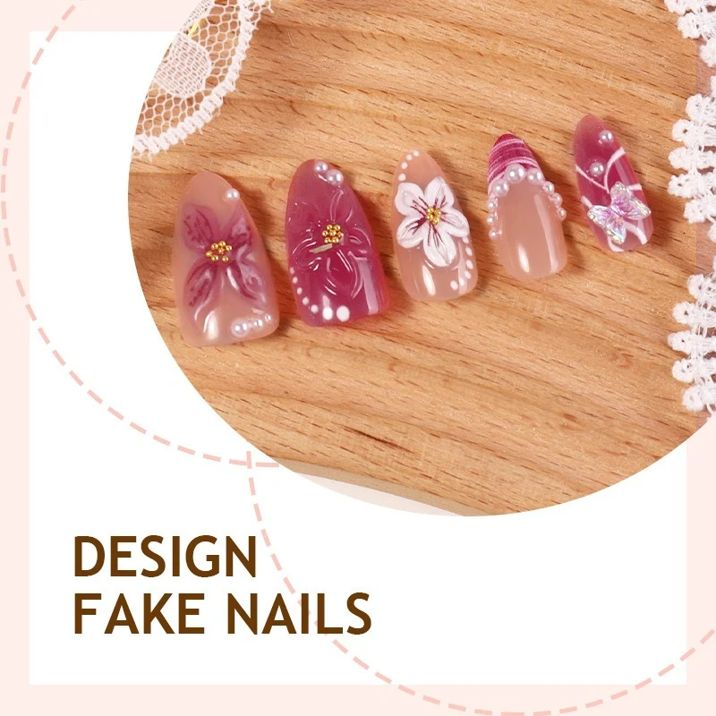 Kunstnagelset mit floralem Design und Glitzerakzenten Brehn