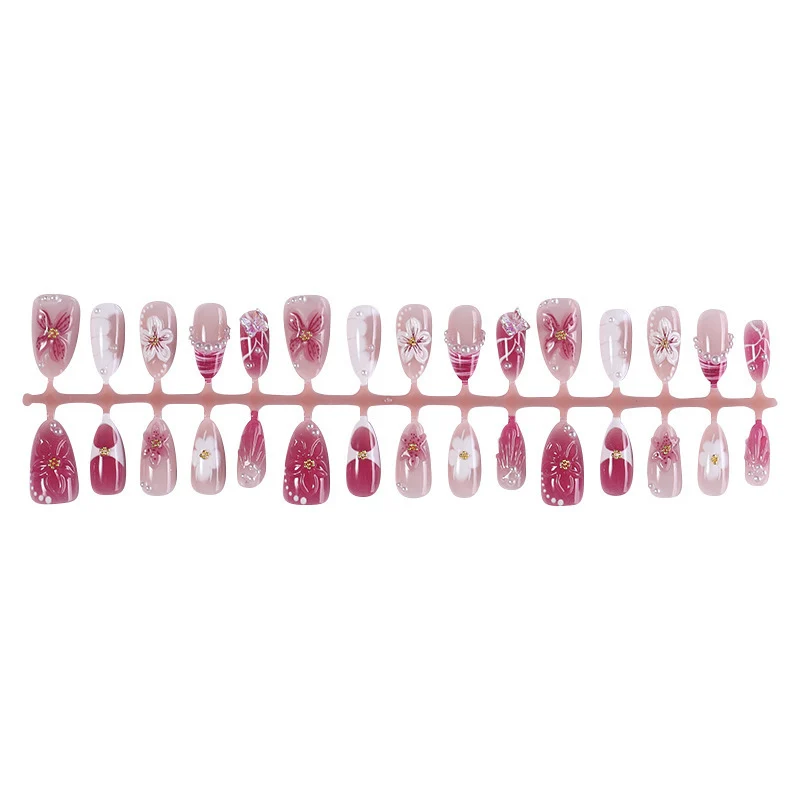Kunstnagelset mit floralem Design und Glitzerakzenten Brehn