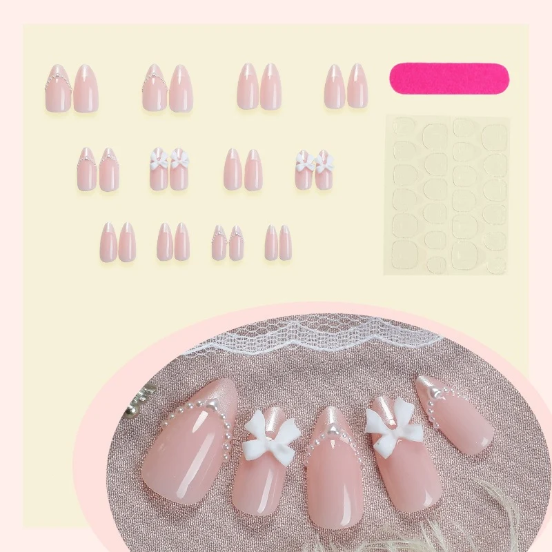 Kunstnagelset mit eleganten Schleifen und Perlen Brehn