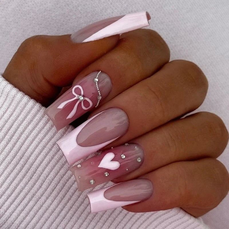 Kunstnagelset mit eleganten Schleifen- und Glitzermotiven Brehn