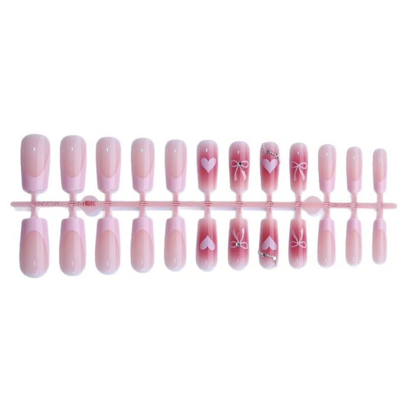 Kunstnagelset mit eleganten Schleifen- und Glitzermotiven Brehn
