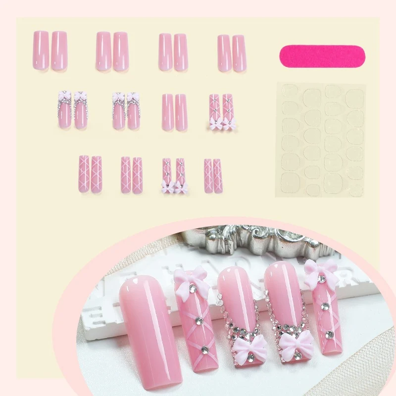 Kunstnagelset mit eleganten Schleifen- und Glitzerakzenten Brehn