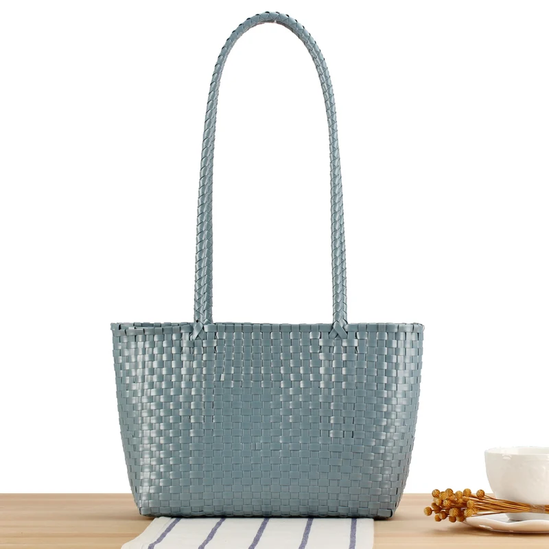 Handtasche mit Flechtdesign und langen Trägern Skanto