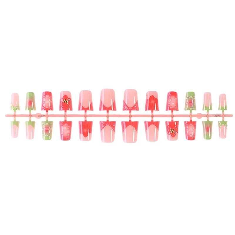 Kunstnagelset mit fruchtigen und glitzernden Designs Brehn