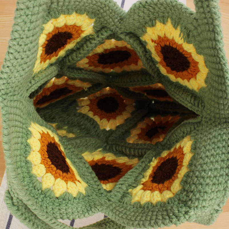 Kreative Häkeltasche mit einzigartigem Sonnenblumenmuster Skanto
