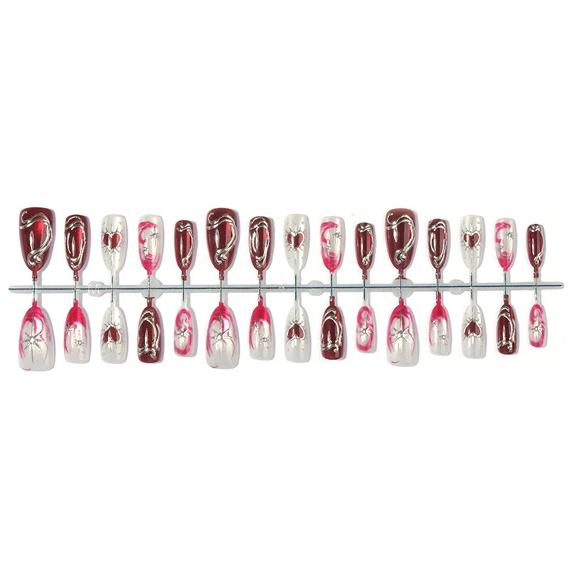 Kunstnagelset mit eleganten Herz- und Glitzermotiven Brehn
