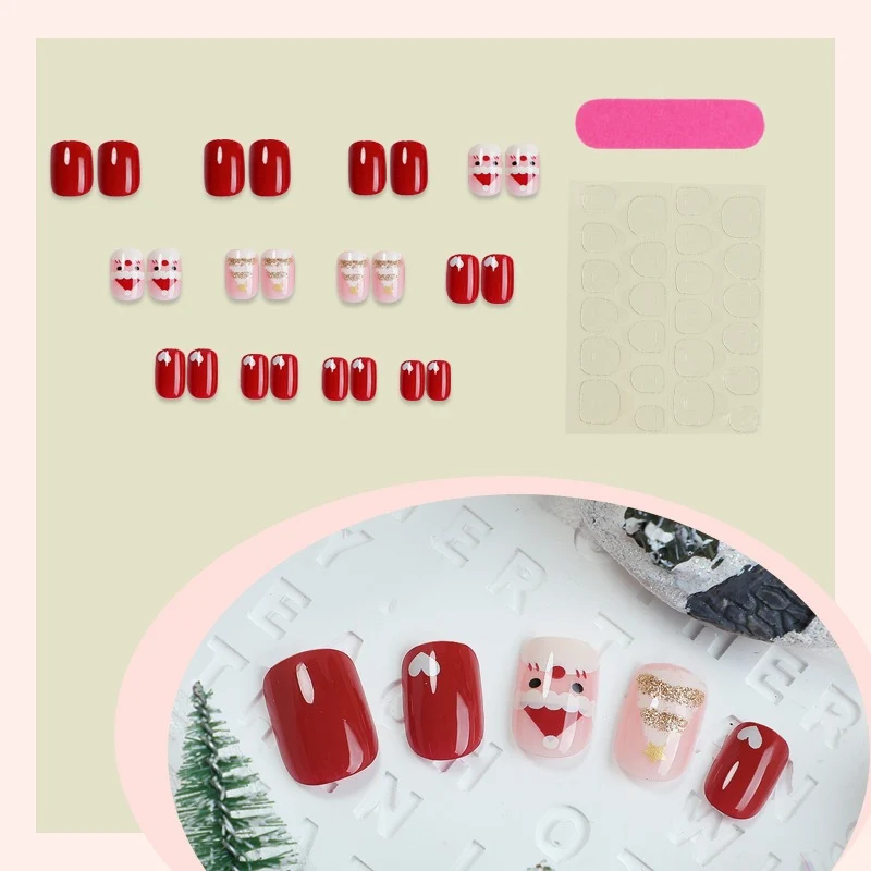 Kunstnagelset mit festlichen Weihnachtsmotiven und Glitzerakzenten Brehn